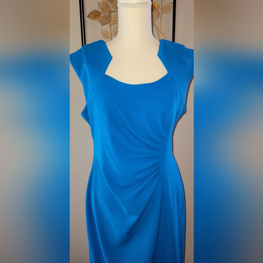 Beautiful turquoise dress 👗 w/ruching at waist.